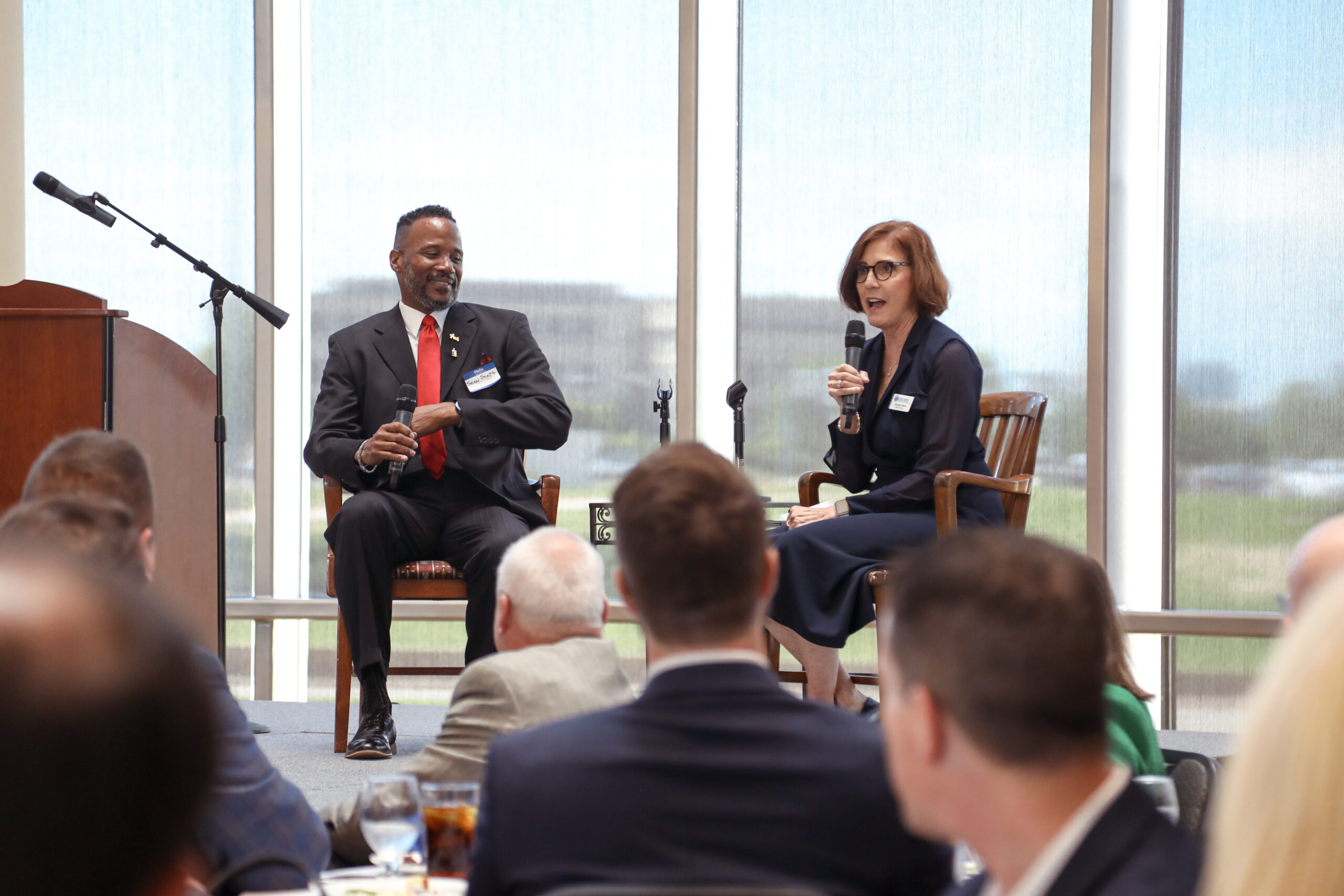Dr. Christine North at a Jesus House luncheon